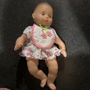 American Girl Bitty Baby Doll in White Floral Dress with Pink Bib and glasses.